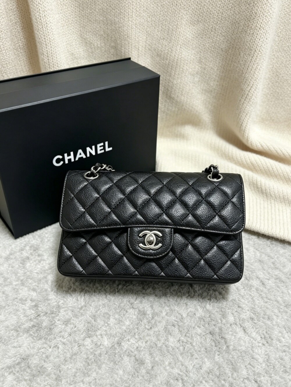 CHANEL Classic Flap Bag in Black Caviar Leather